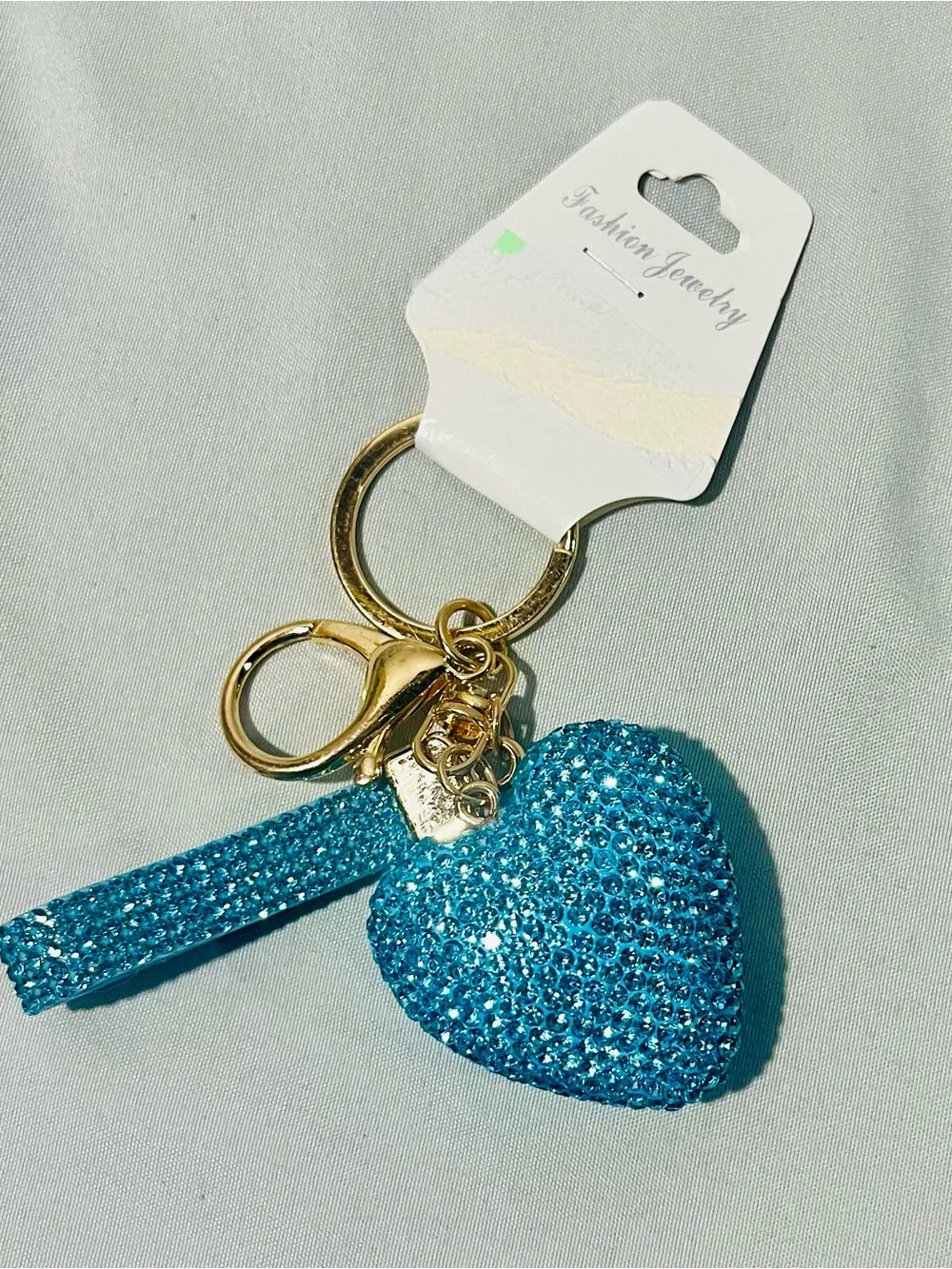 Fashion Jewelry Gold Keyring with Blue Crystal Heart and Strap